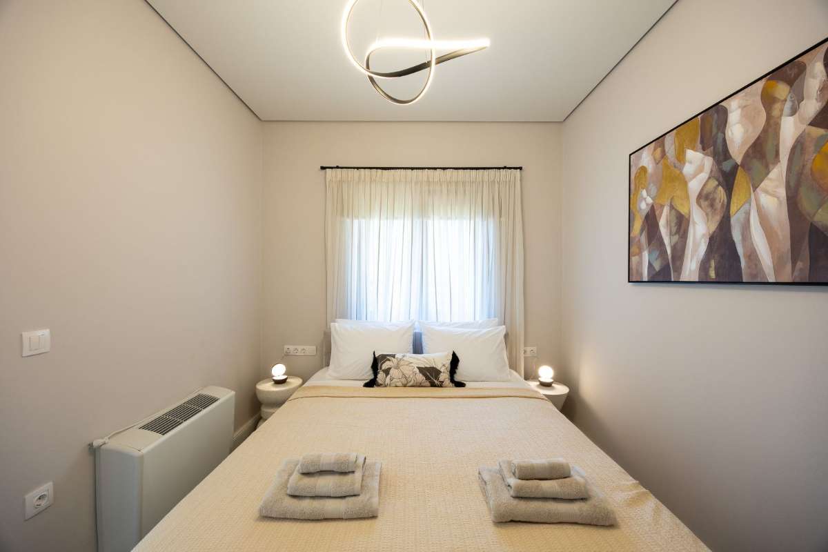 Master bedroom with king-size bed