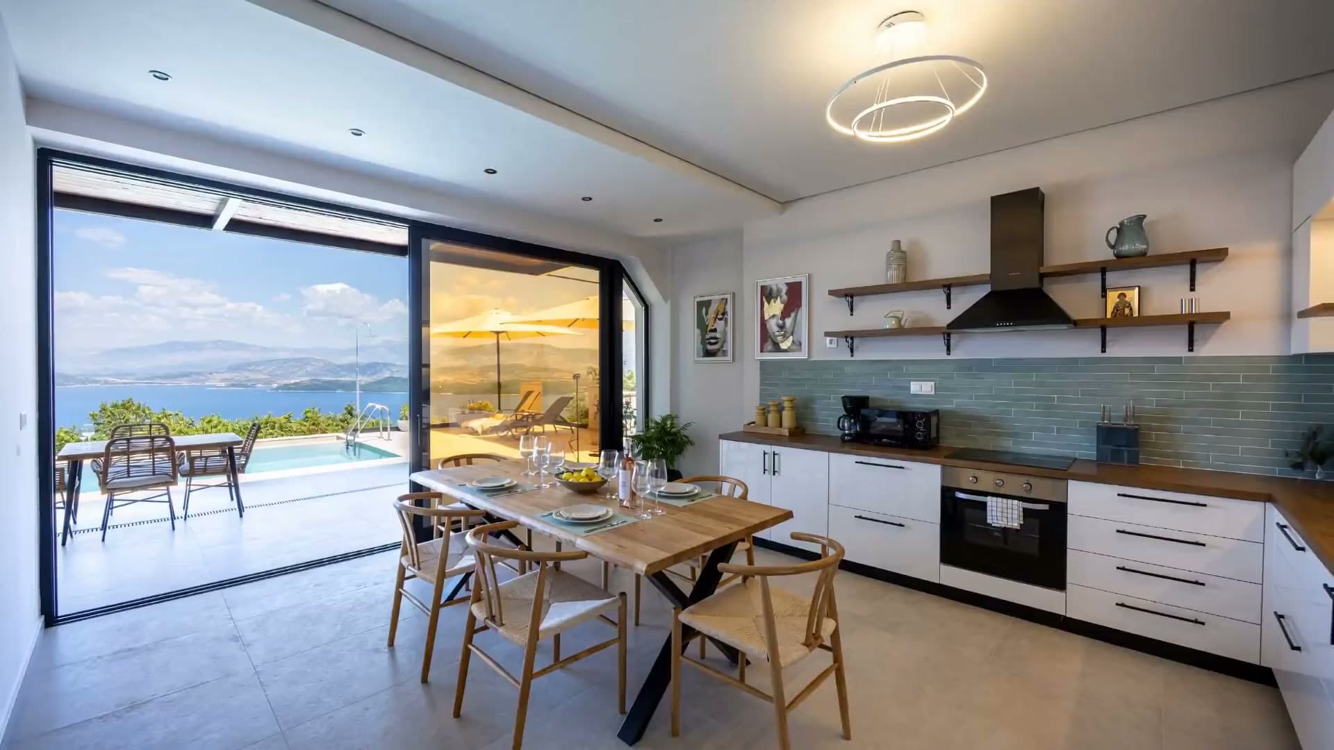 Open-plan living opening to the terrace and sea